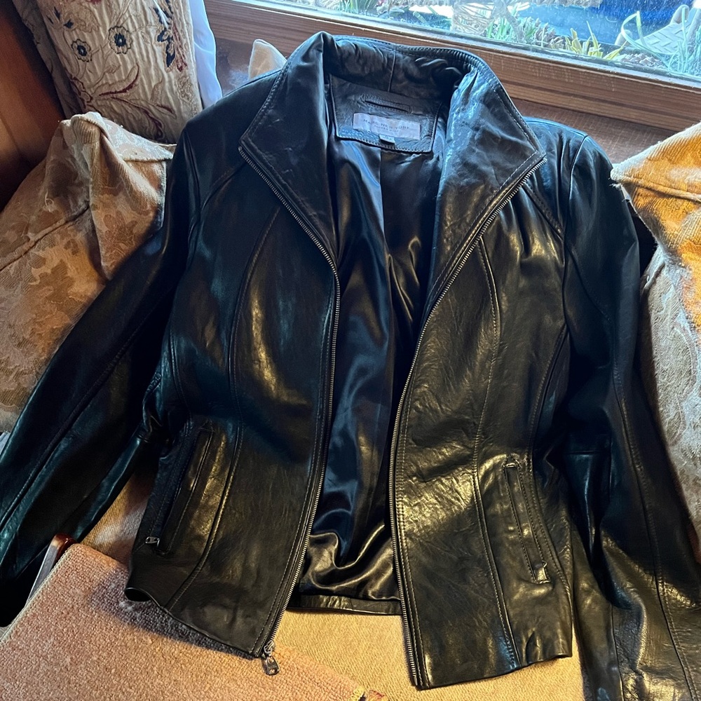 Leather jacket size XL .